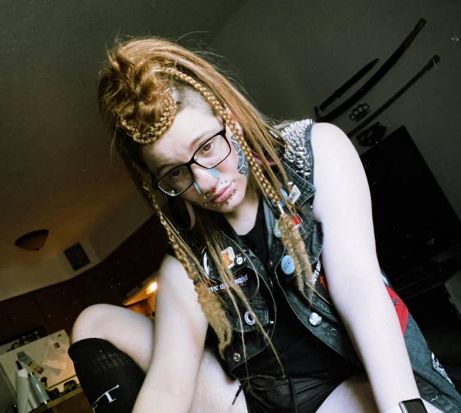 American Girl Gets 28 Piercings And Implanted Horns