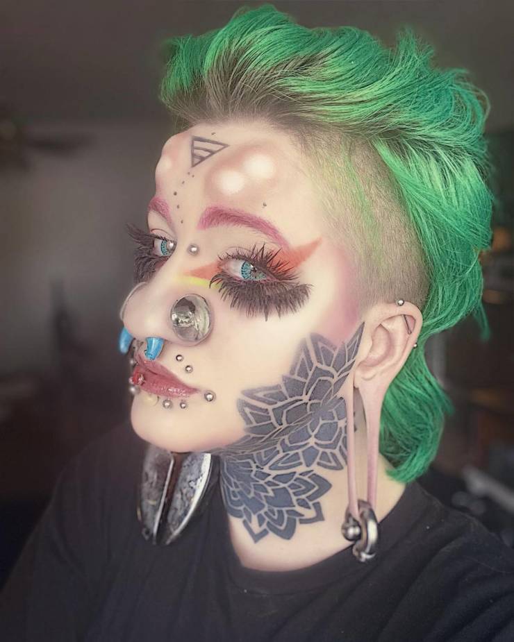 American Girl Gets 28 Piercings And Implanted Horns