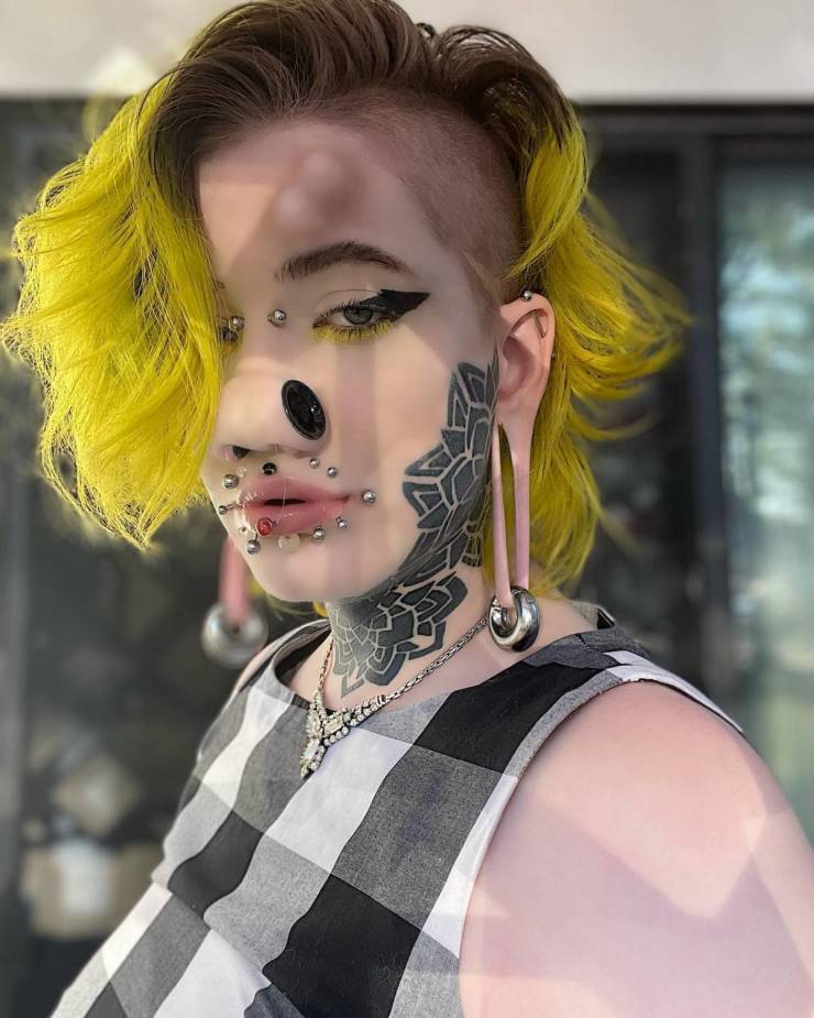 American Girl Gets 28 Piercings And Implanted Horns