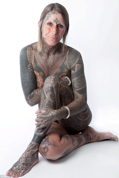 Divorcee Celebrates By Tattooing Entire Body