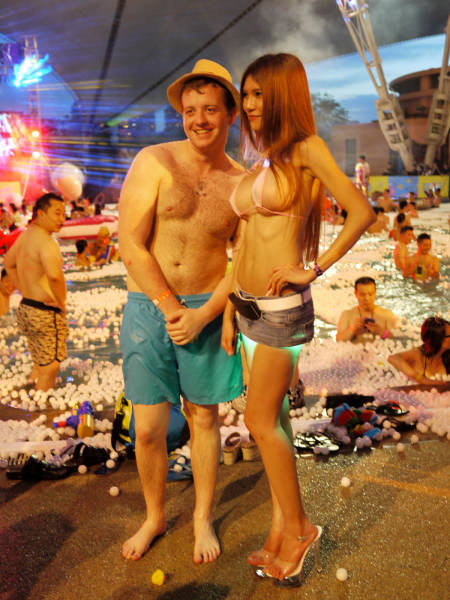 A Chinese Model Earns Money By Walking Around Half-Naked